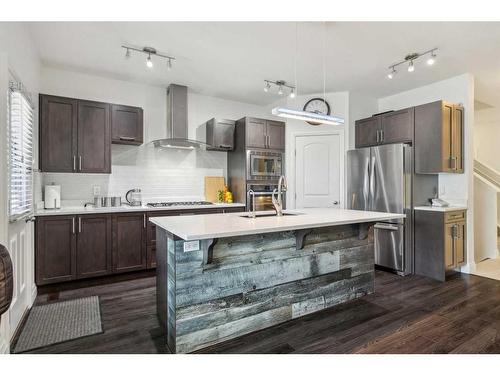27 Legacy Reach Manor Se, Calgary, AB - Indoor Photo Showing Kitchen With Stainless Steel Kitchen With Upgraded Kitchen