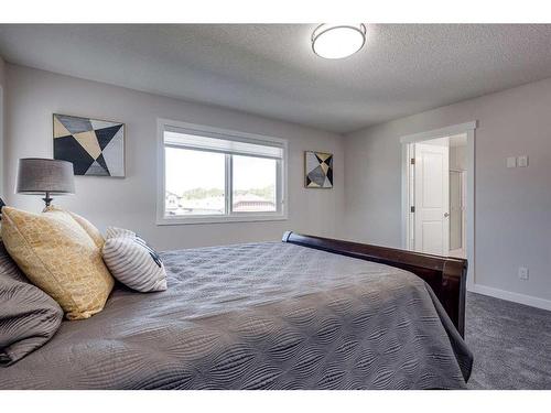 4231 63 Avenue, Innisfail, AB - Indoor Photo Showing Bedroom