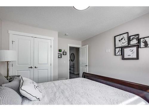 4231 63 Avenue, Innisfail, AB - Indoor Photo Showing Bedroom