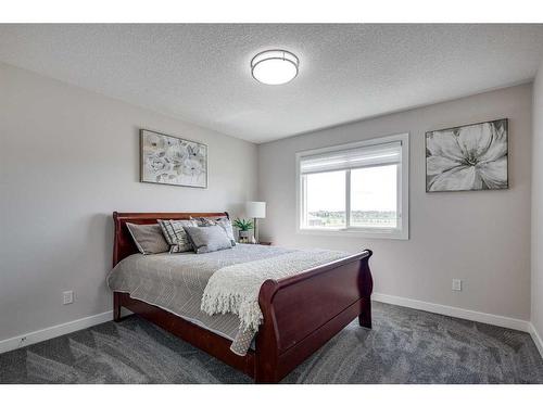 4231 63 Avenue, Innisfail, AB - Indoor Photo Showing Bedroom