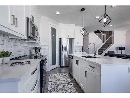 4231 63 Avenue, Innisfail, AB - Indoor Photo Showing Kitchen With Double Sink With Upgraded Kitchen