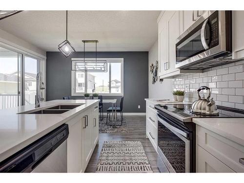 4231 63 Avenue, Innisfail, AB - Indoor Photo Showing Kitchen With Double Sink With Upgraded Kitchen