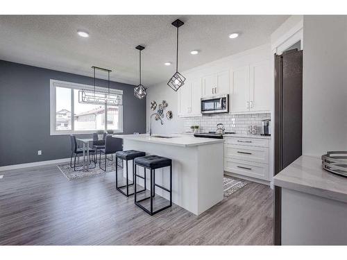 4231 63 Avenue, Innisfail, AB - Indoor Photo Showing Kitchen With Upgraded Kitchen