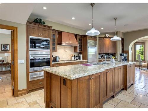 116 Elbow Ridge Bluffs, Rural Rocky View County, AB - Indoor Photo Showing Kitchen With Double Sink