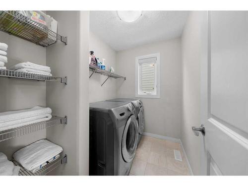 147 Auburn Shores Way Se, Calgary, AB - Indoor Photo Showing Laundry Room