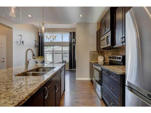 108 New Brighton Grove Se, Calgary, AB - Indoor Photo Showing Kitchen With Double Sink With Upgraded Kitchen