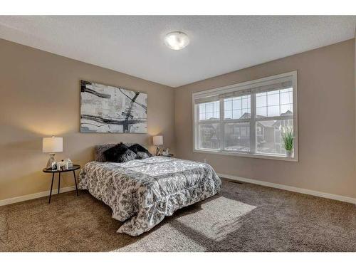 108 New Brighton Grove Se, Calgary, AB - Indoor Photo Showing Bedroom