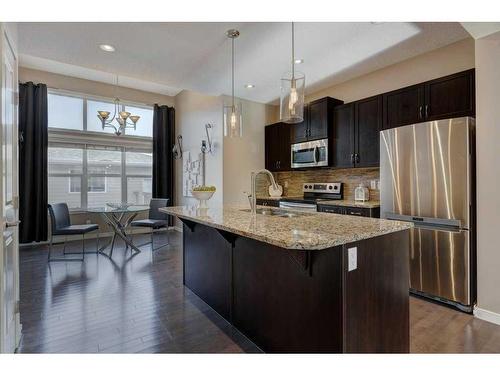 108 New Brighton Grove Se, Calgary, AB - Indoor Photo Showing Kitchen With Upgraded Kitchen