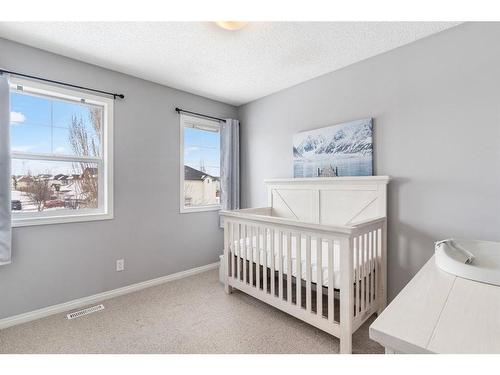 27 Evansmeade Common Nw, Calgary, AB - Indoor Photo Showing Bedroom