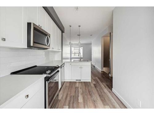 27 Evanscrest Park Nw, Calgary, AB - Indoor Photo Showing Kitchen With Upgraded Kitchen