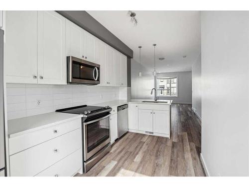 27 Evanscrest Park Nw, Calgary, AB - Indoor Photo Showing Kitchen With Upgraded Kitchen