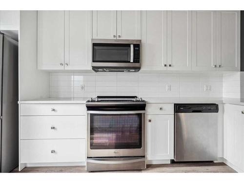 27 Evanscrest Park Nw, Calgary, AB - Indoor Photo Showing Kitchen