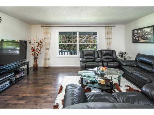 245 Silverado Way Sw, Calgary, AB - Indoor Photo Showing Living Room