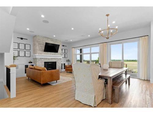 22 Coutts Close, Olds, AB - Indoor Photo Showing Living Room With Fireplace