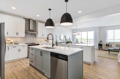 34 Walcrest Row Se, Calgary, AB - Indoor Photo Showing Kitchen With Double Sink With Upgraded Kitchen