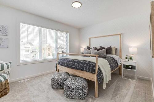 34 Walcrest Row Se, Calgary, AB - Indoor Photo Showing Bedroom