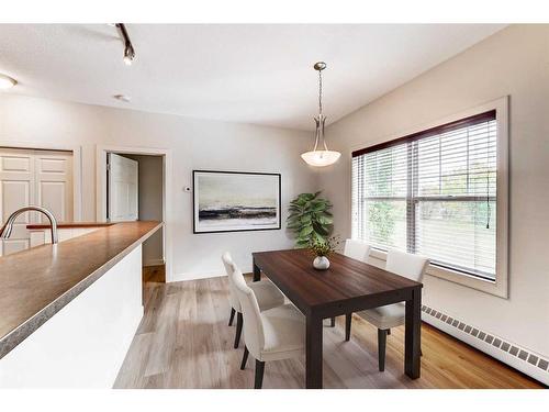 200-1414 17 Street Se, Calgary, AB - Indoor Photo Showing Dining Room