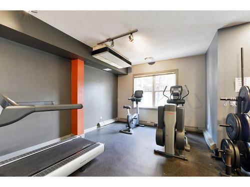 200-1414 17 Street Se, Calgary, AB - Indoor Photo Showing Gym Room