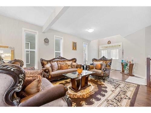 115 Saddlelake Way Ne, Calgary, AB - Indoor Photo Showing Living Room With Fireplace