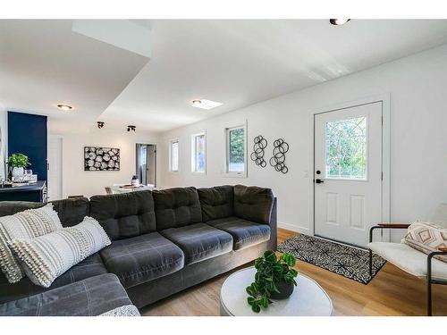 144 Hawkwood Drive Nw, Calgary, AB - Indoor Photo Showing Living Room With Fireplace