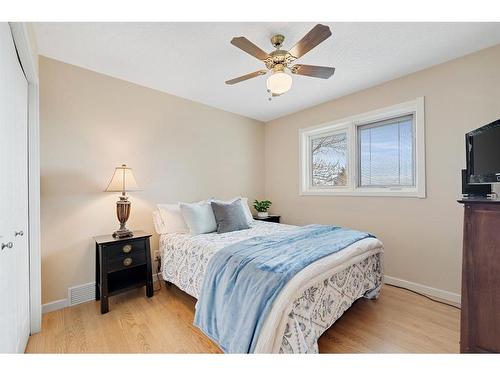 176 Strathaven Circle Sw, Calgary, AB - Indoor Photo Showing Bedroom