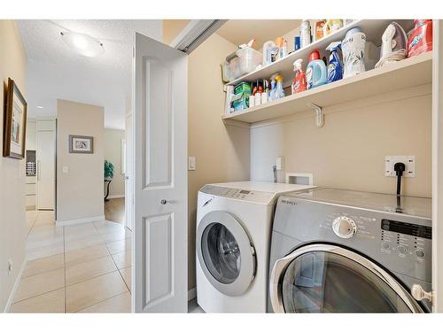 176 Strathaven Circle Sw, Calgary, AB - Indoor Photo Showing Laundry Room