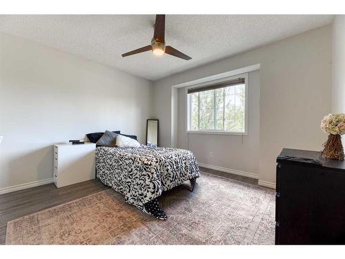 48 Prestwick Estate Way Se, Calgary, AB - Indoor Photo Showing Bedroom