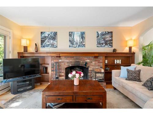 1428 Premier Way Sw, Calgary, AB - Indoor Photo Showing Living Room With Fireplace