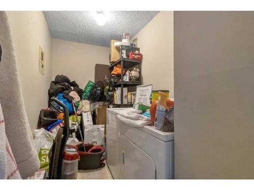 206-2200 Woodview Drive Sw, Calgary, AB - Indoor Photo Showing Laundry Room