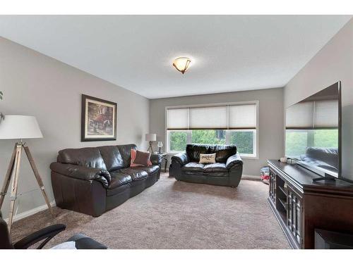 363 Cranleigh View Se, Calgary, AB - Indoor Photo Showing Living Room