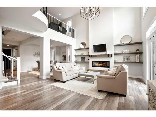 60 Auburn Shores Lane Se, Calgary, AB - Indoor Photo Showing Living Room With Fireplace