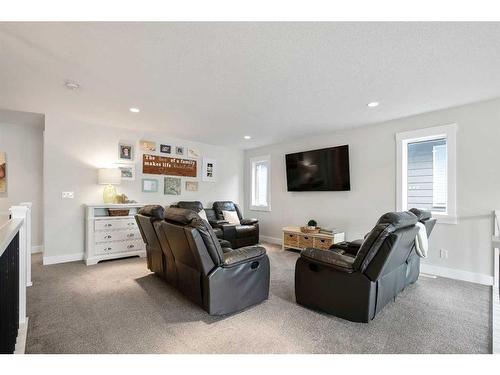 60 Auburn Shores Se, Calgary, AB - Indoor Photo Showing Living Room