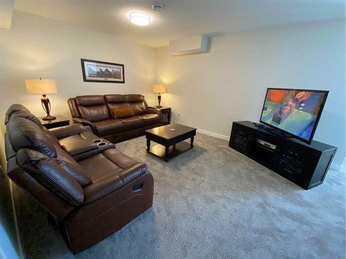 729 Mandalay Avenue Nw, Carstairs, AB - Indoor Photo Showing Living Room