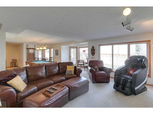 132 Patterson Drive Sw, Calgary, AB - Indoor Photo Showing Living Room