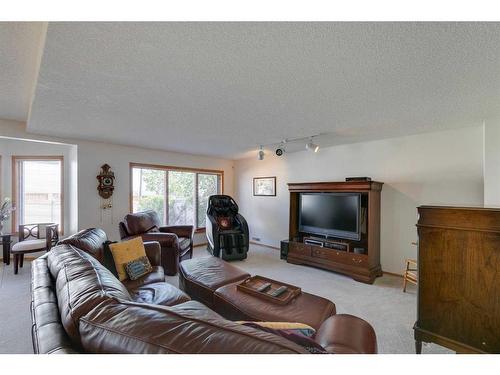132 Patterson Drive Sw, Calgary, AB - Indoor Photo Showing Living Room
