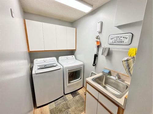 85 Manyhorses Drive, Rural Rocky View County, AB - Indoor Photo Showing Laundry Room