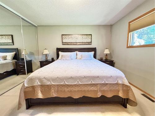 85 Manyhorses Drive, Rural Rocky View County, AB - Indoor Photo Showing Bedroom