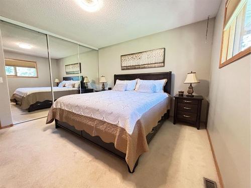 85 Manyhorses Drive, Rural Rocky View County, AB - Indoor Photo Showing Bedroom