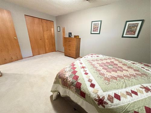 85 Manyhorses Drive, Rural Rocky View County, AB - Indoor Photo Showing Bedroom