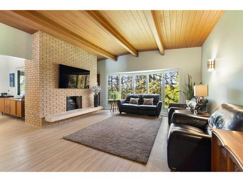 3615 Umber Place Nw, Calgary, AB - Indoor Photo Showing Living Room With Fireplace