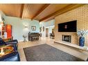 3615 Umber Place Nw, Calgary, AB  - Indoor Photo Showing Living Room With Fireplace 
