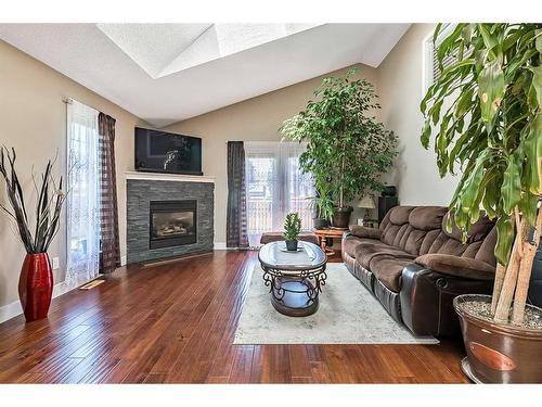 226 Somerset Drive, Calgary, AB - Indoor Photo Showing Living Room With Fireplace