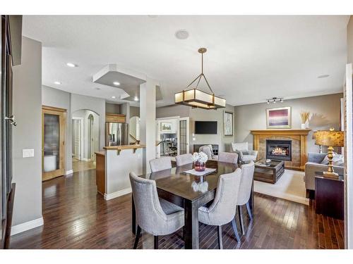 55 Valley Crest Close Nw, Calgary, AB - Indoor Photo Showing Dining Room With Fireplace