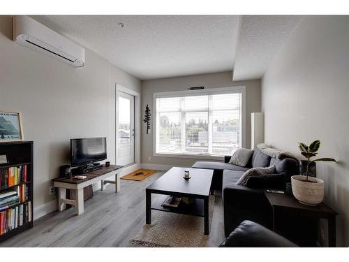 407-1702 17 Avenue Sw, Calgary, AB - Indoor Photo Showing Living Room