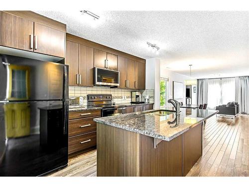 520 Mckenzie Towne Close Se, Calgary, AB - Indoor Photo Showing Kitchen With Upgraded Kitchen