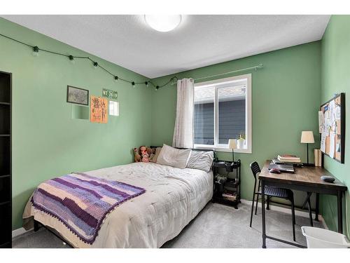 12 Legacy Bay Se, Calgary, AB - Indoor Photo Showing Bedroom