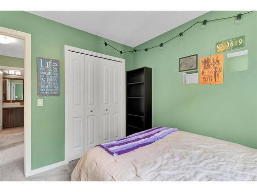 12 Legacy Bay Se, Calgary, AB - Indoor Photo Showing Bedroom