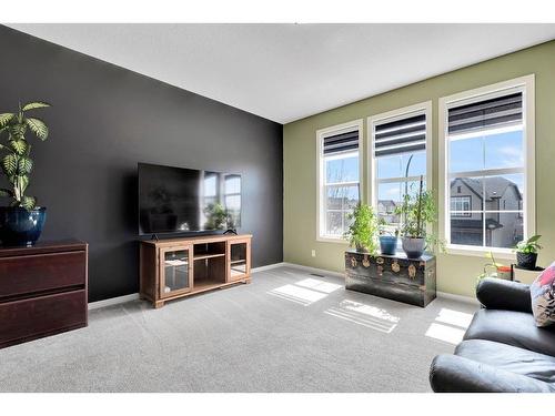 12 Legacy Bay Se, Calgary, AB - Indoor Photo Showing Living Room