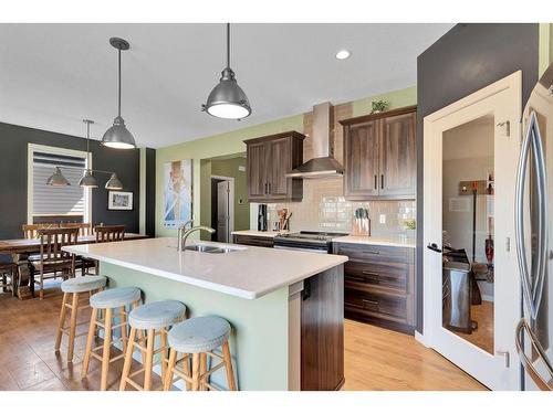 12 Legacy Bay Se, Calgary, AB - Indoor Photo Showing Kitchen With Stainless Steel Kitchen With Double Sink With Upgraded Kitchen