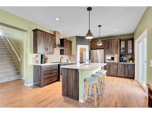 12 Legacy Bay Se, Calgary, AB - Indoor Photo Showing Kitchen With Stainless Steel Kitchen With Upgraded Kitchen